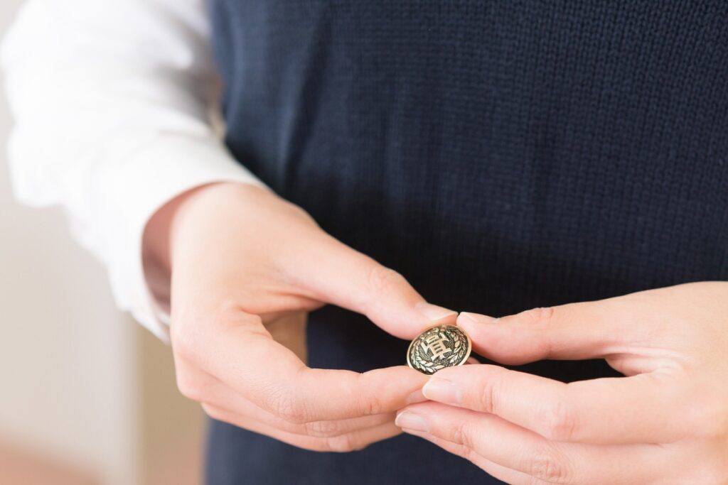 Donner son deuxième bouton